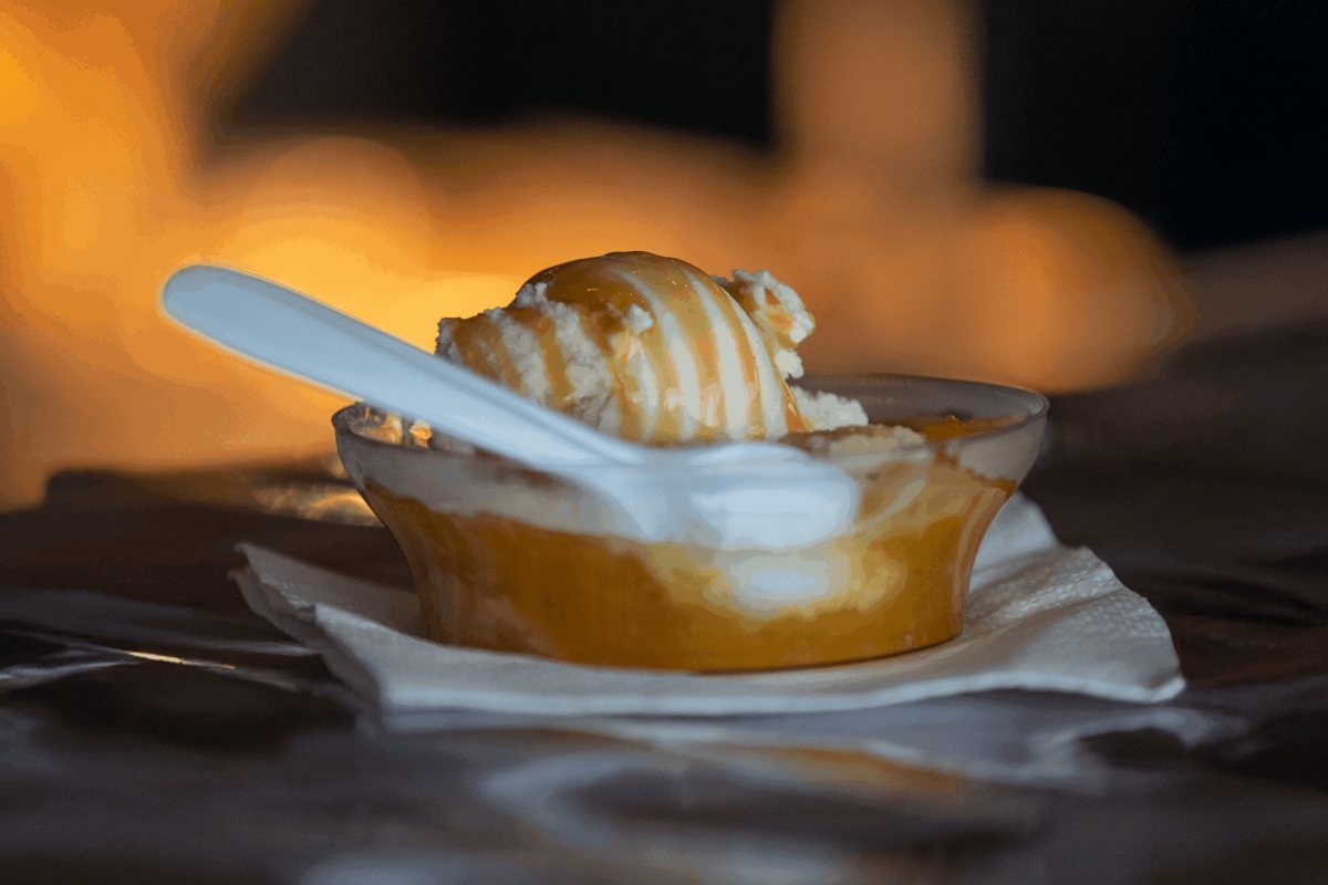 A warm dessert served with ice cream